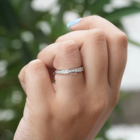 Close-Up View of Round Cut Channel Set Eternity Wedding Ring In White Gold