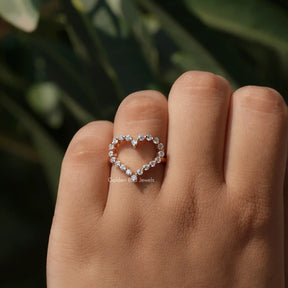 View of Round Cut Heart Shaped Proposal Ring In Finger