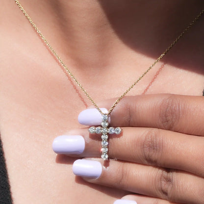 In hand showing view of moissanite pendant	 		