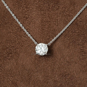 In front view of moissanite Round  cut pendant