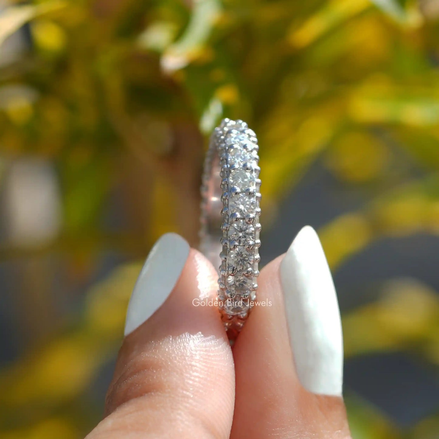 Moissanit-Eternity-Ring im Rundschliff und Pavéfassung
