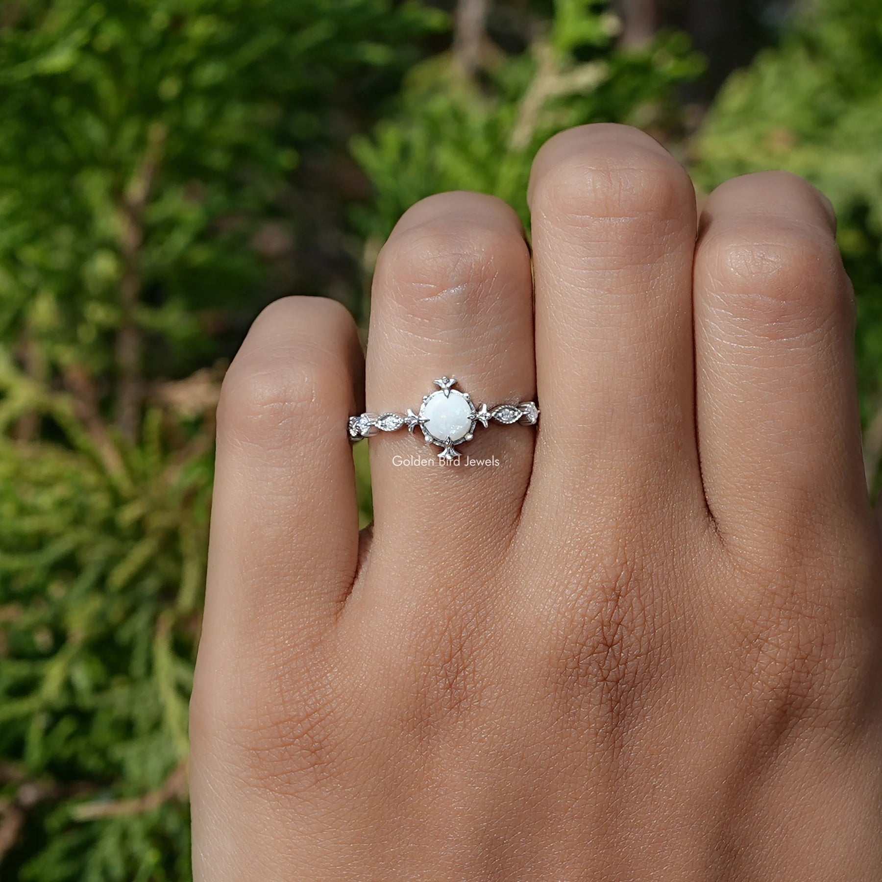 View of Round Cut Opal Gemstone Engagement Ring In White Gold