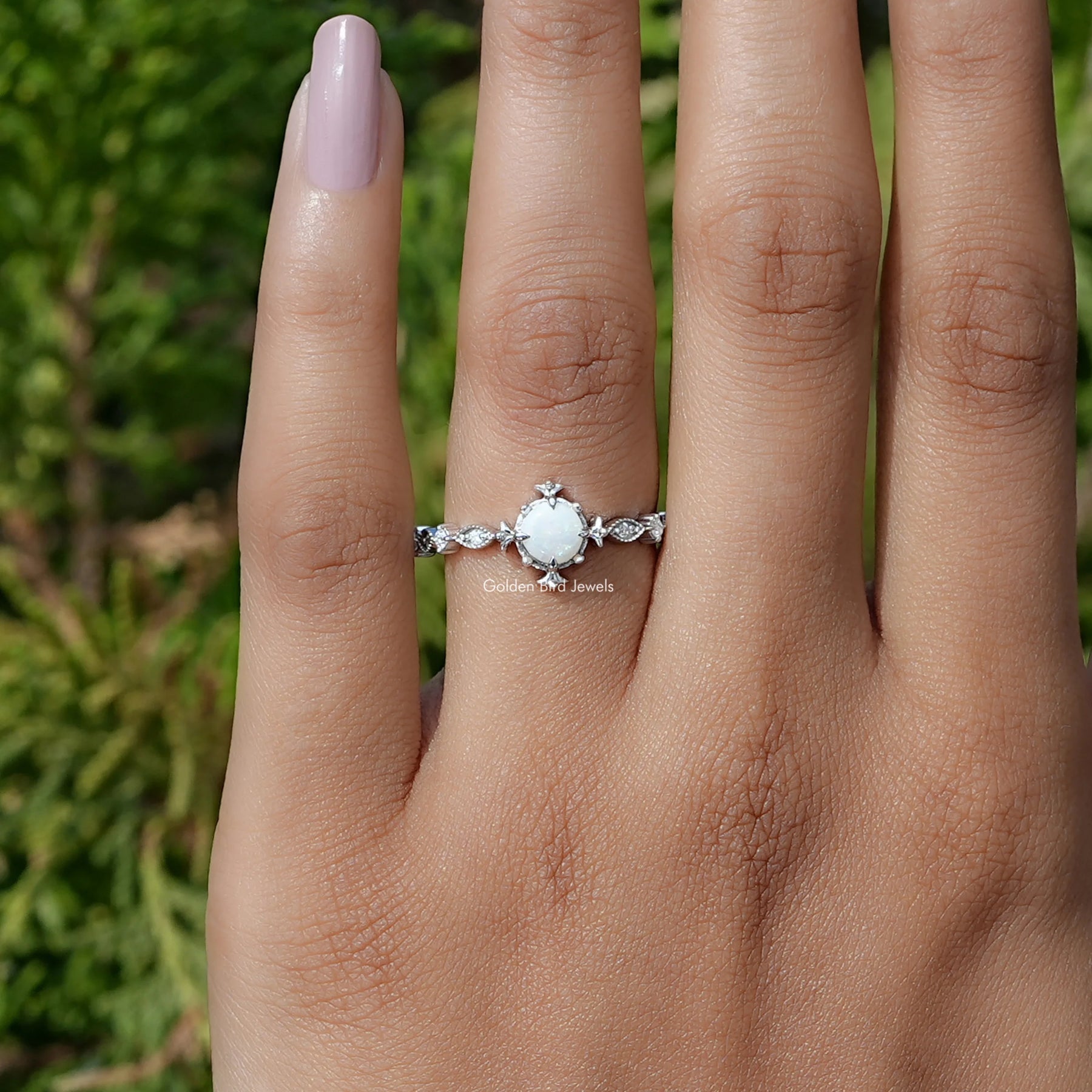 Detailed View Of Round Cut Opal Gemstone Ring In White Gold