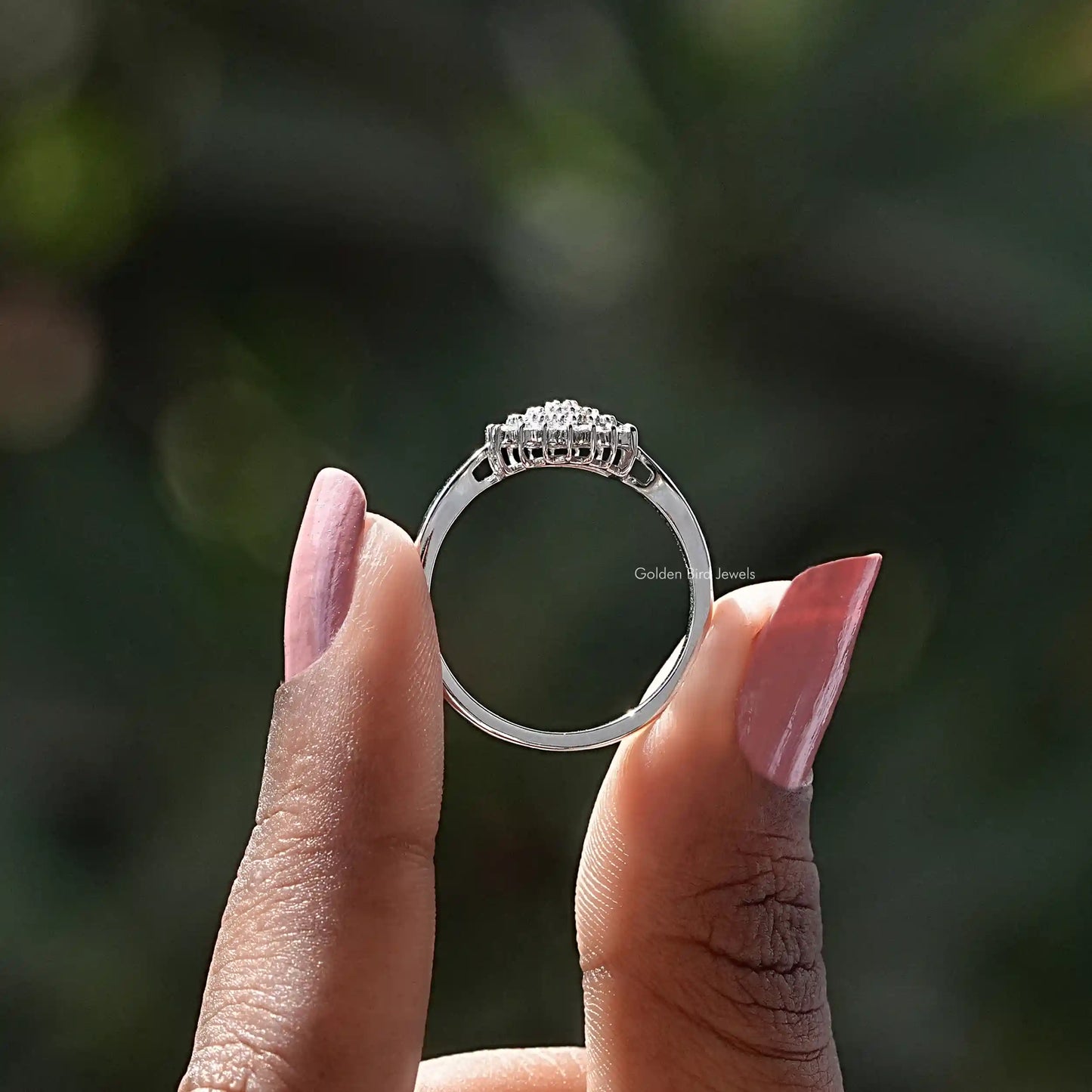 Back view of white gold ring showcasing round lab-grown diamonds.
