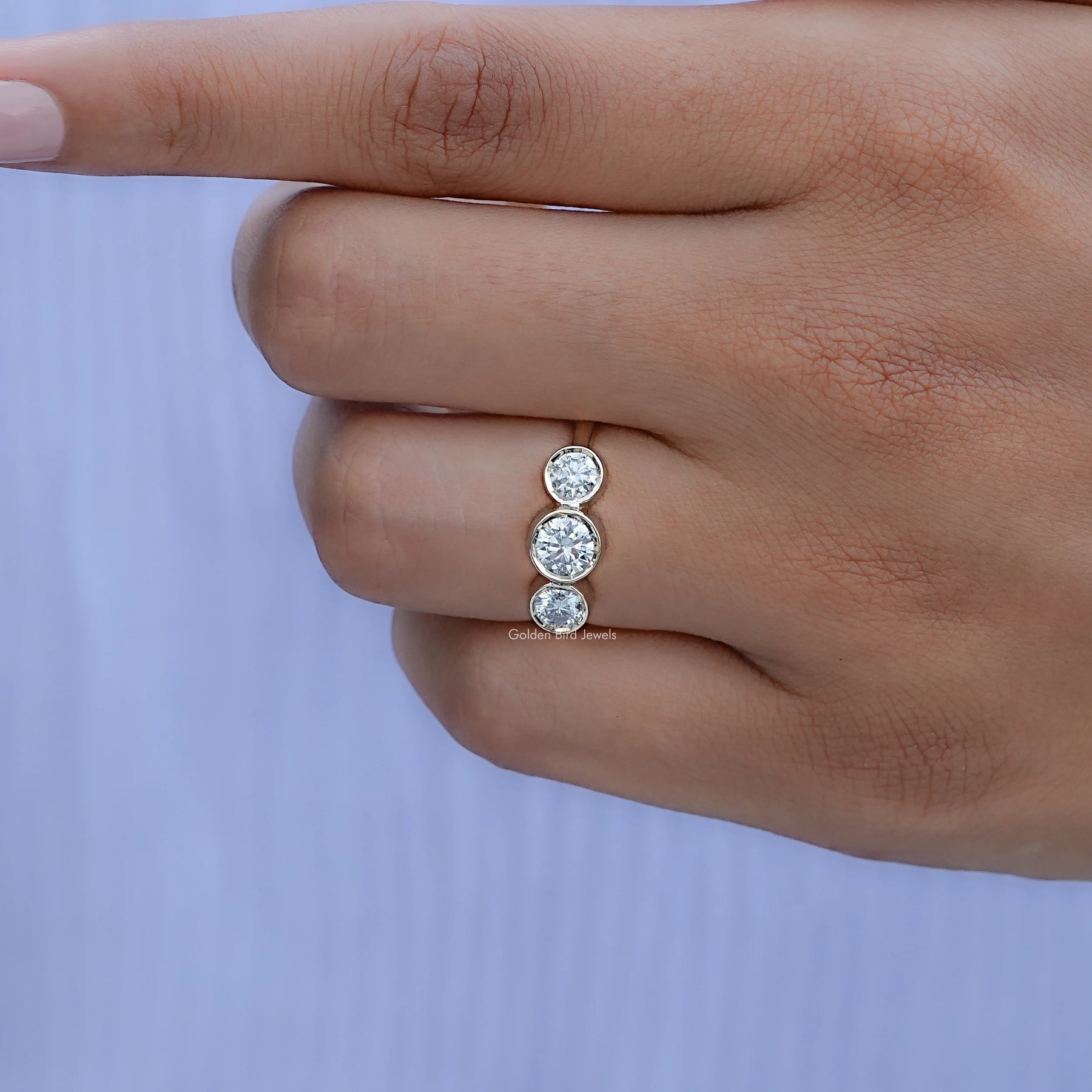 Round Moissanite Three Stone Bezel Set Ring