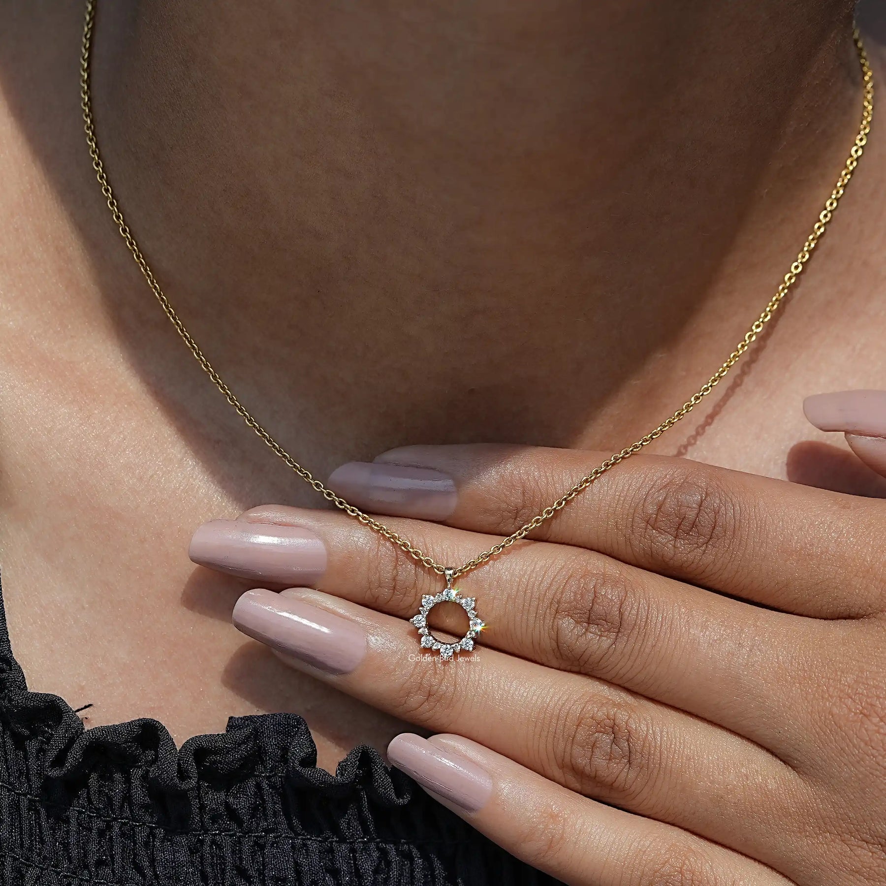 Close-Up View of Round Shaped Diamond Pendant In Yellow Gold