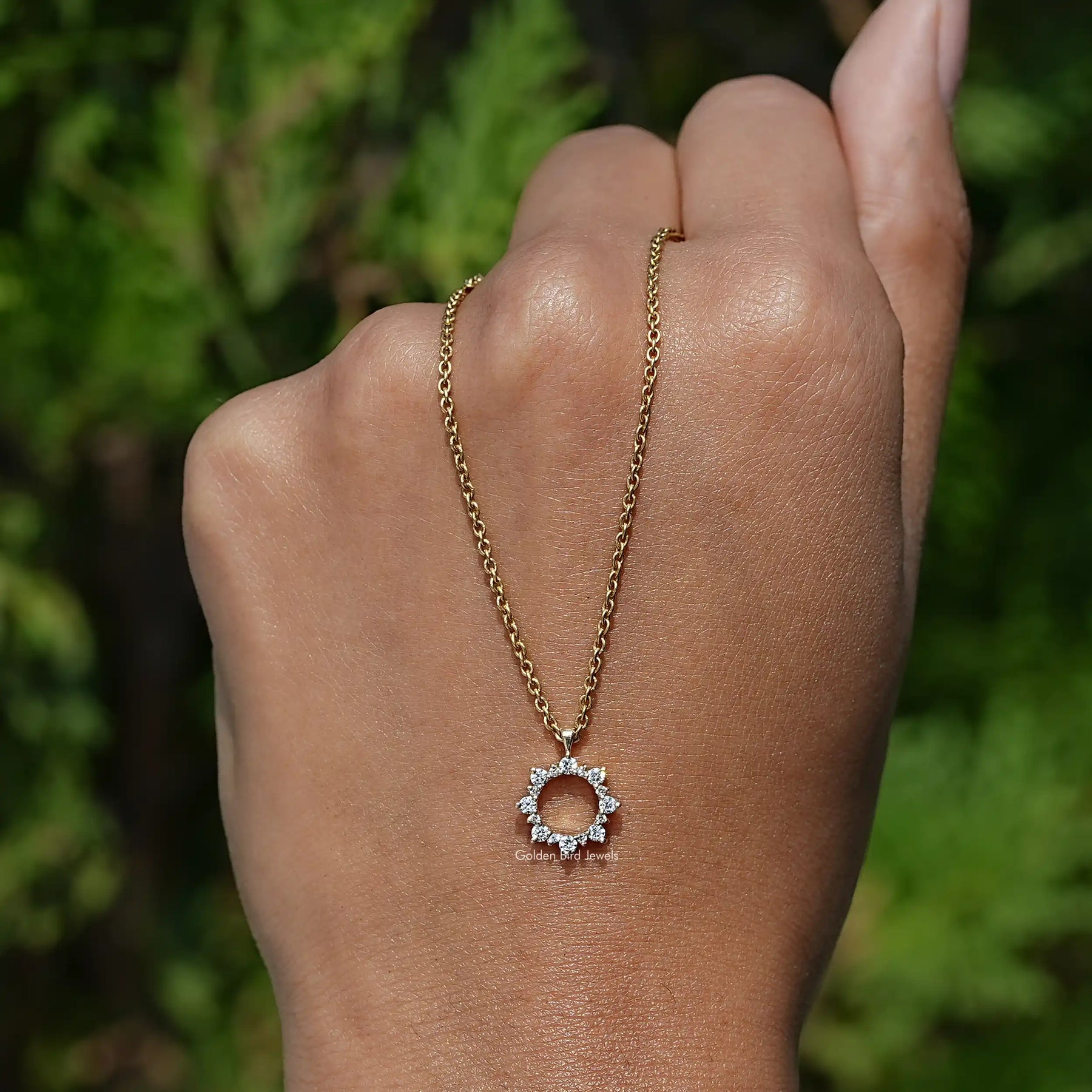 In Hand Holding the Round Cut Lab Diamond Open Circle Pendant