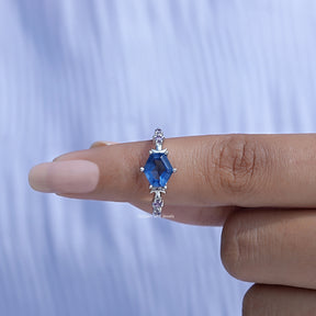 Close-Up View of Blue Hexagon Cut Engagement Ring In White Gold