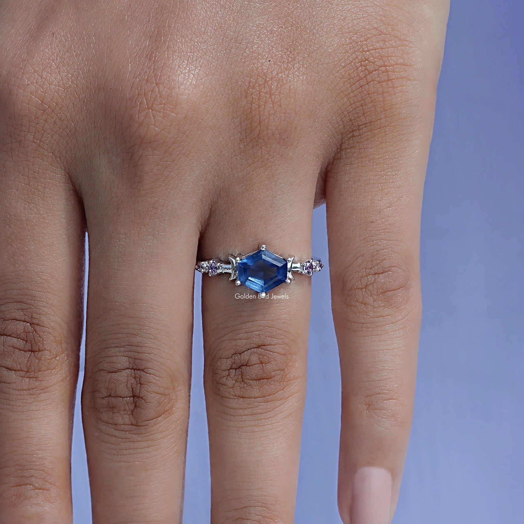 Profile View of Hexagon And Round Cut Gemstone Ring