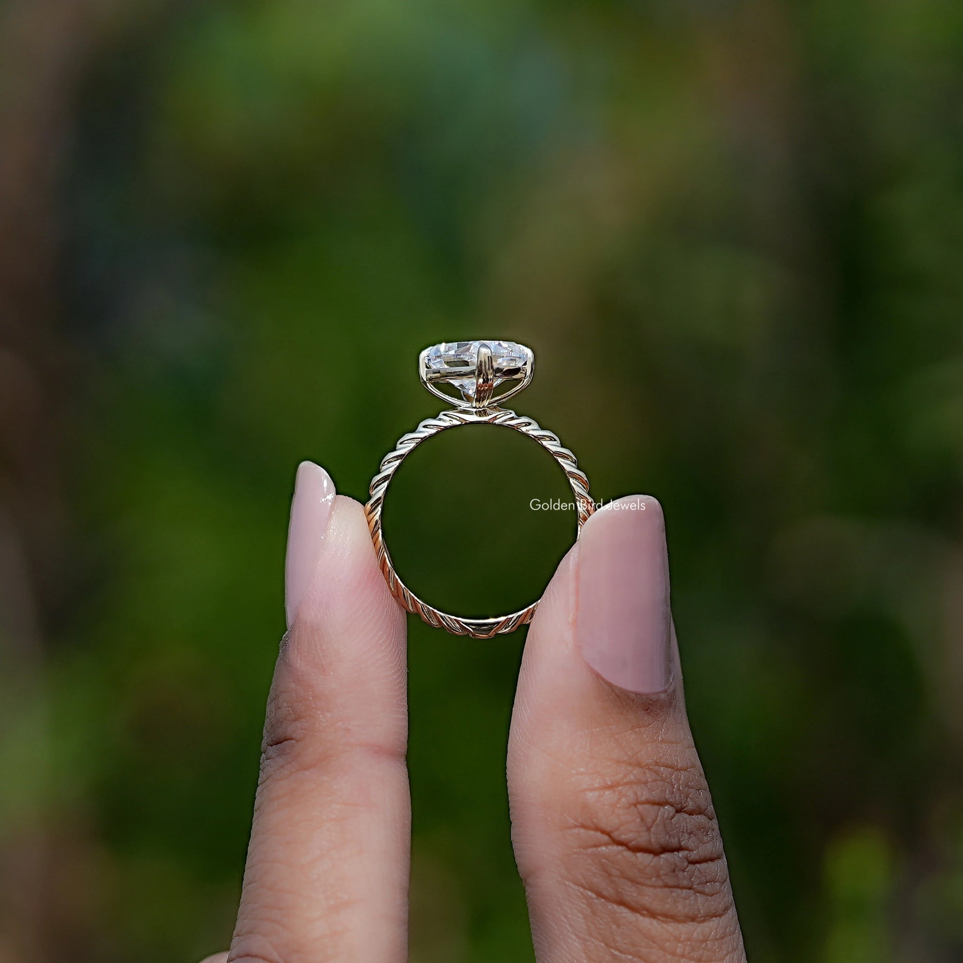 Back view of Cushion Cut Moissanite ring in secure setting 