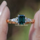 Front view of  Green Emerald cut engagement ring  