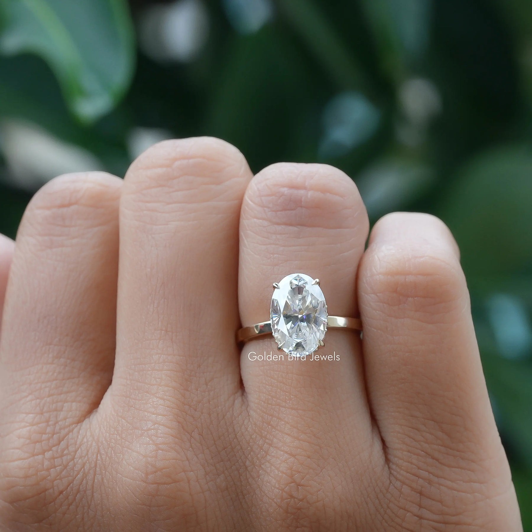 Oval Cut Solitaire Hidden Halo Ring