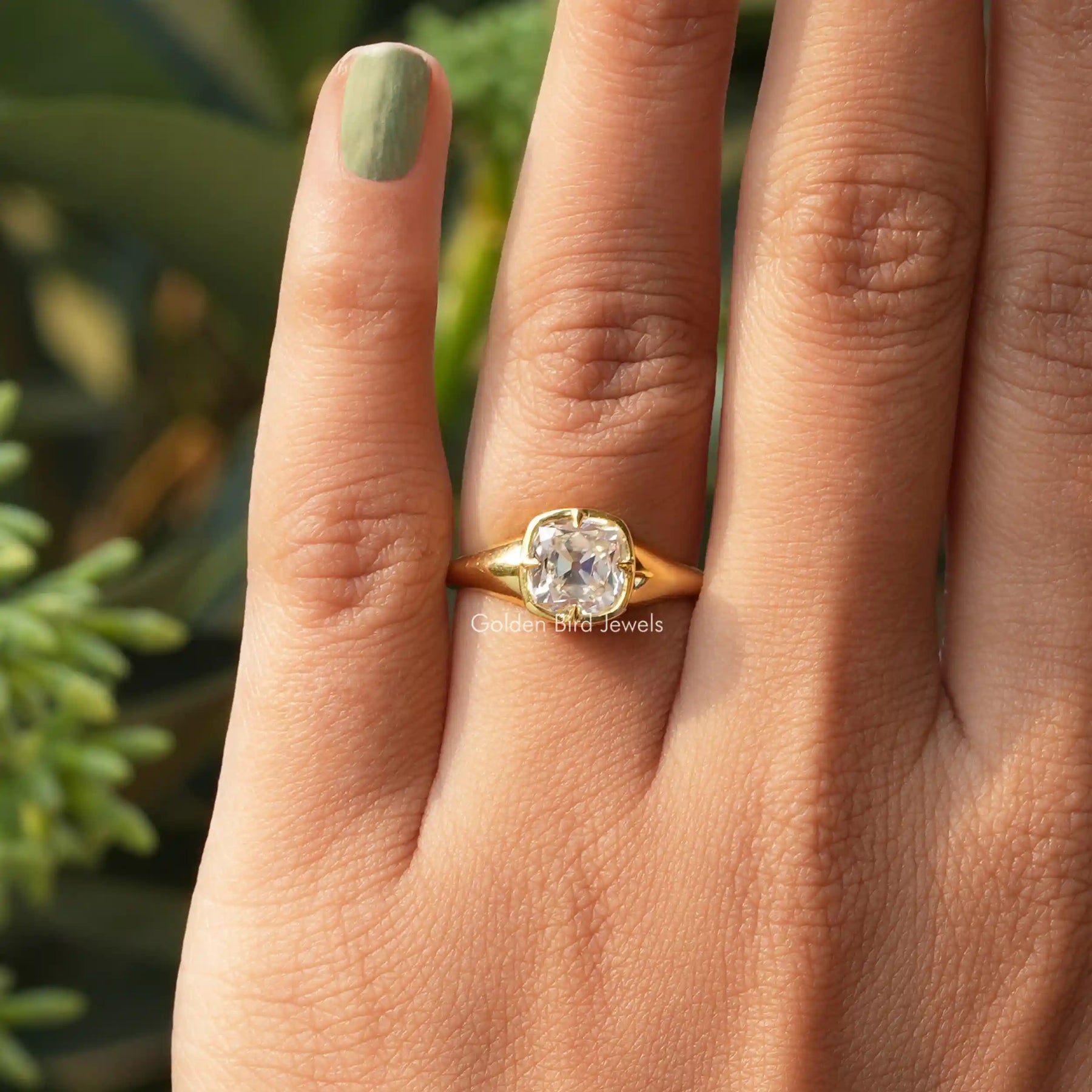 Close-Up View of Cushion Cut Moissanite Solitaire Engagement Ring In Yellow Gold