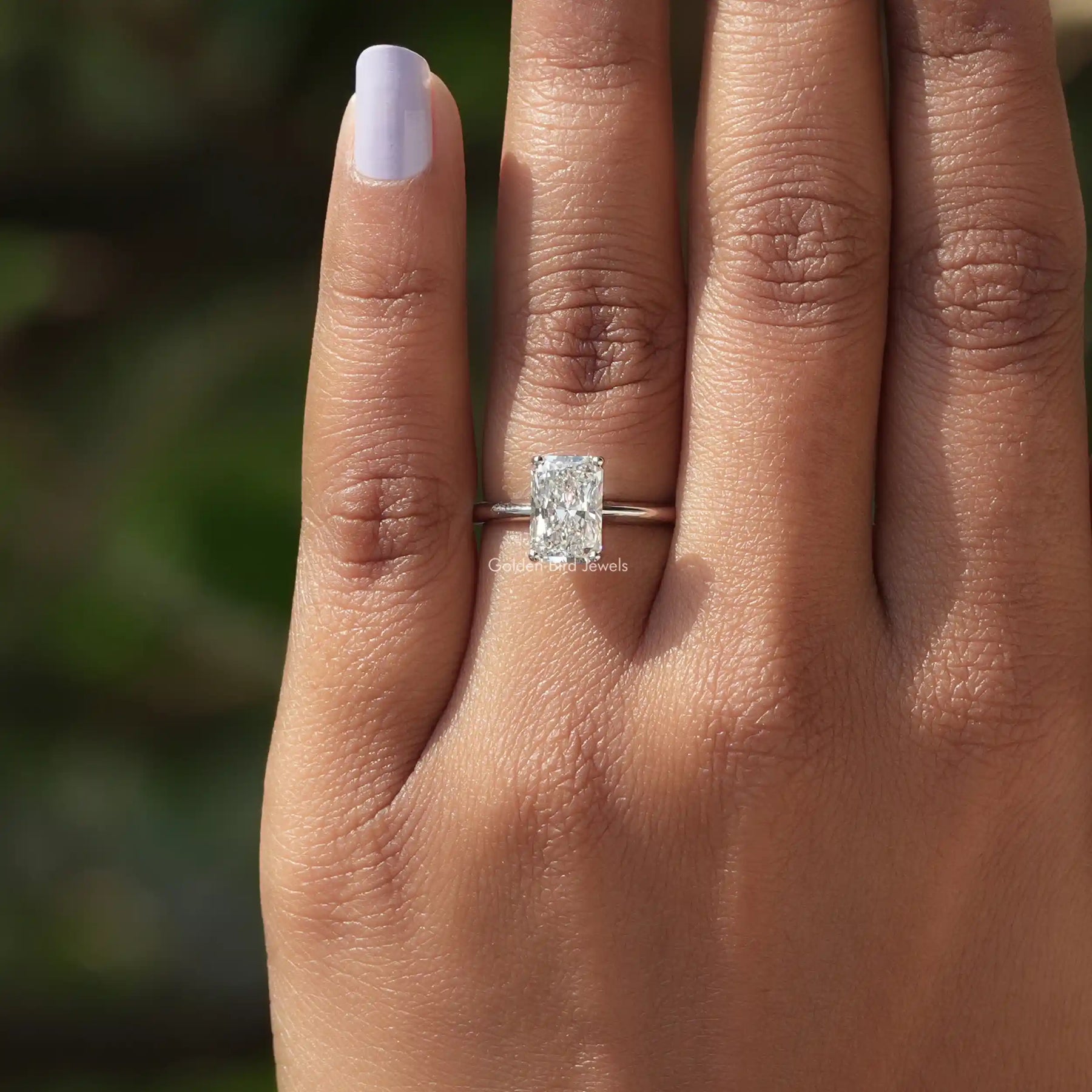 View of Radiant Cut Solitaire Engagement Ring In finger