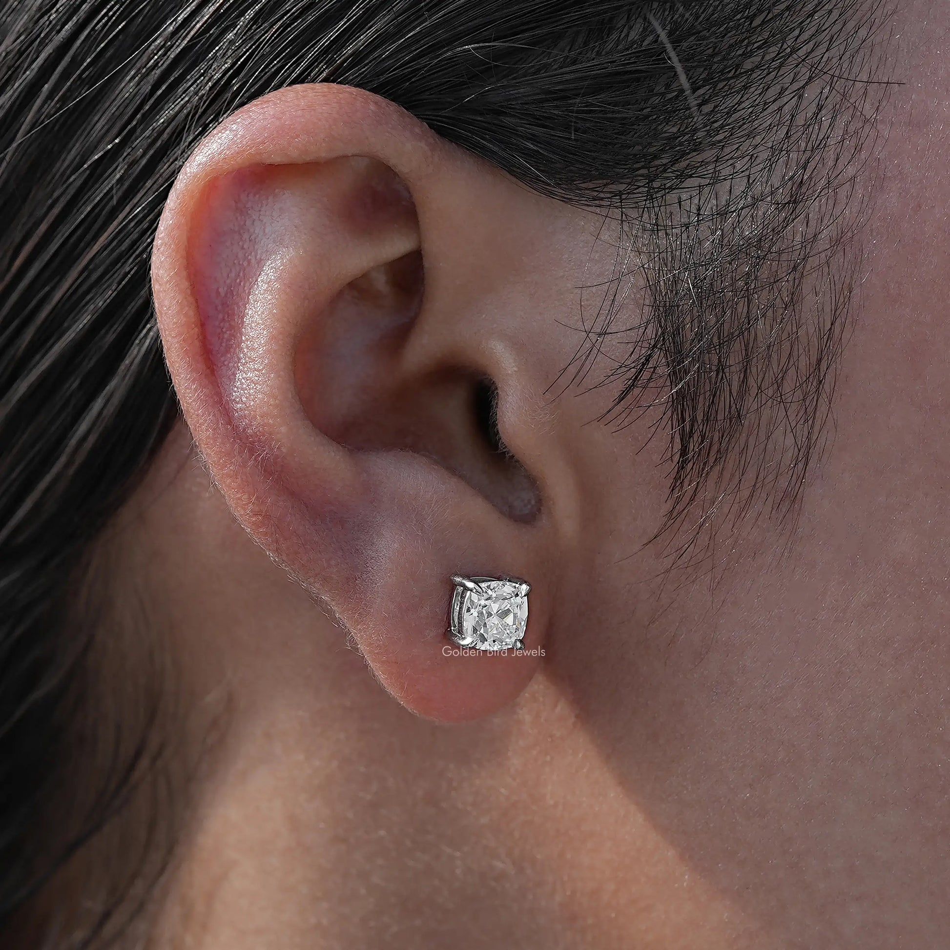 Close view of old  mine square cut diamond  stud earrings  