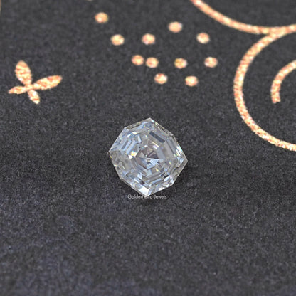 Colorless cushion-cut moissanite loose gemstone, clear top facets in view.