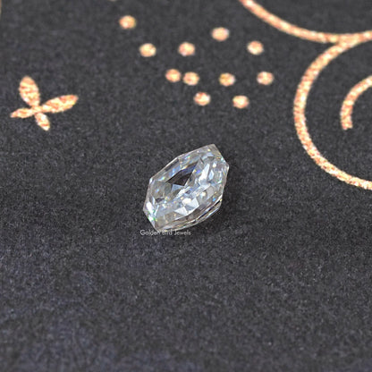 Colorless cushion-cut moissanite loose gemstone, angled view showing step facets.