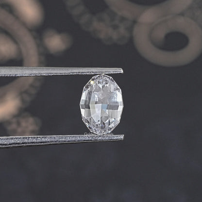 Loose lab-grown oval diamond, step-cut facets in clear tone