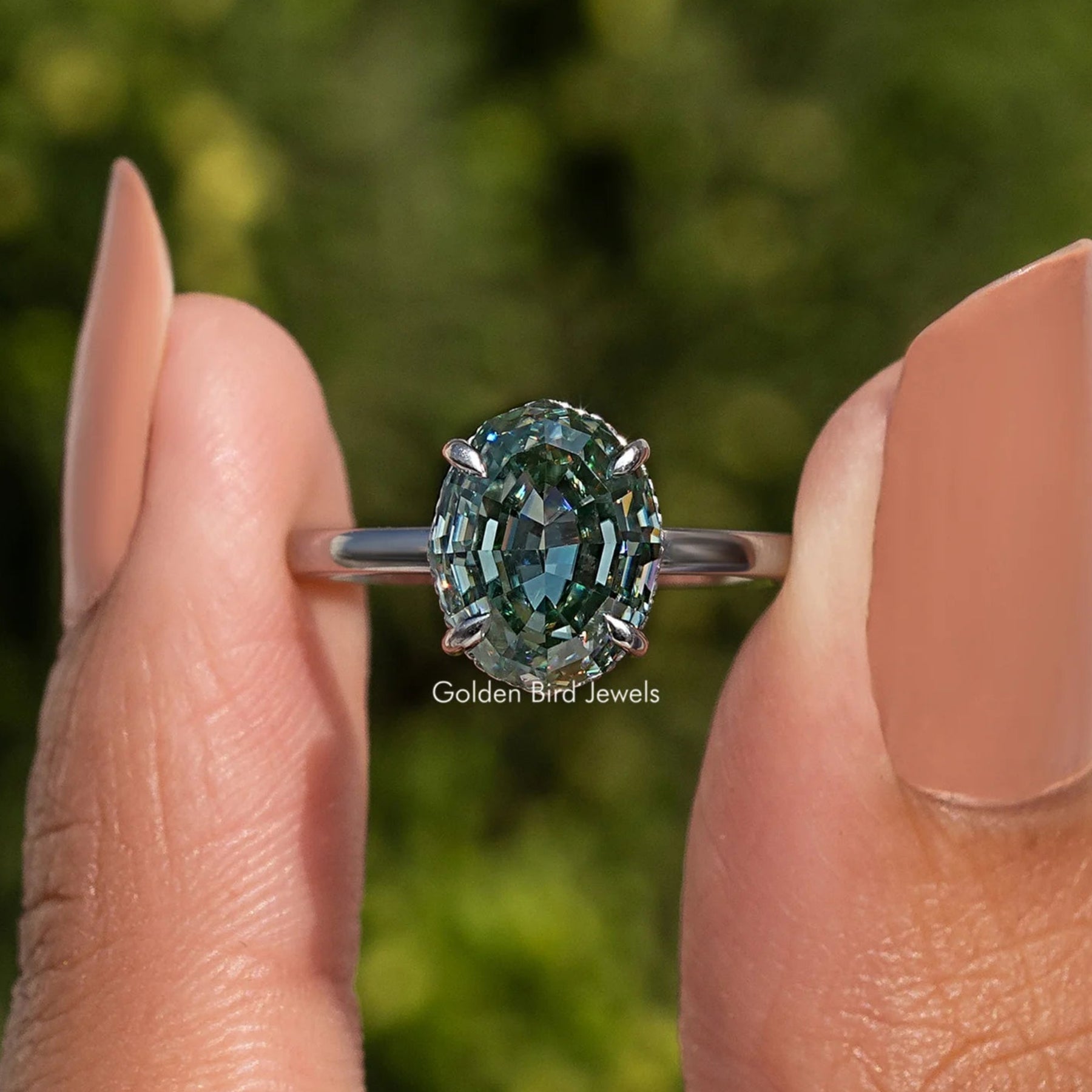 Step Cut Oval Hidden Halo Solitaire Ring