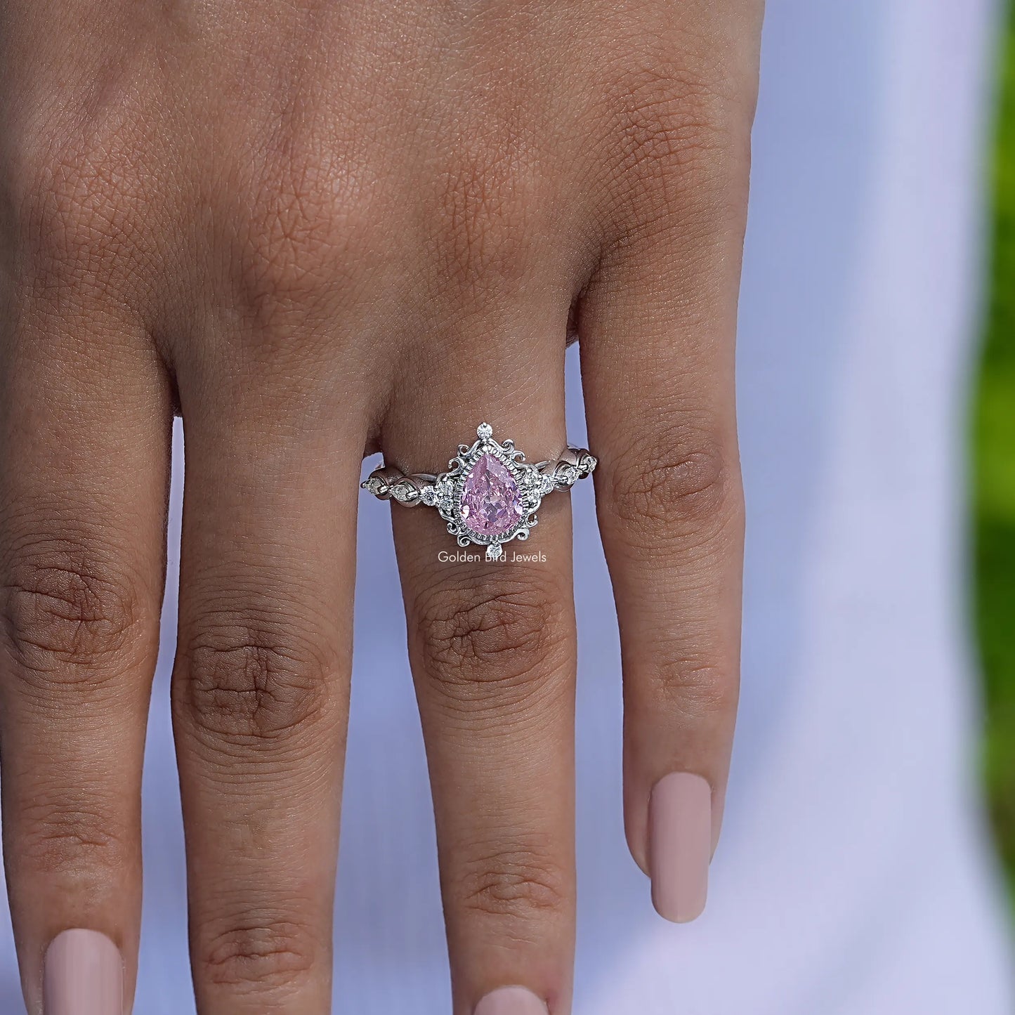 Turmalin-Ring mit rosa Edelstein im Birnenschliff