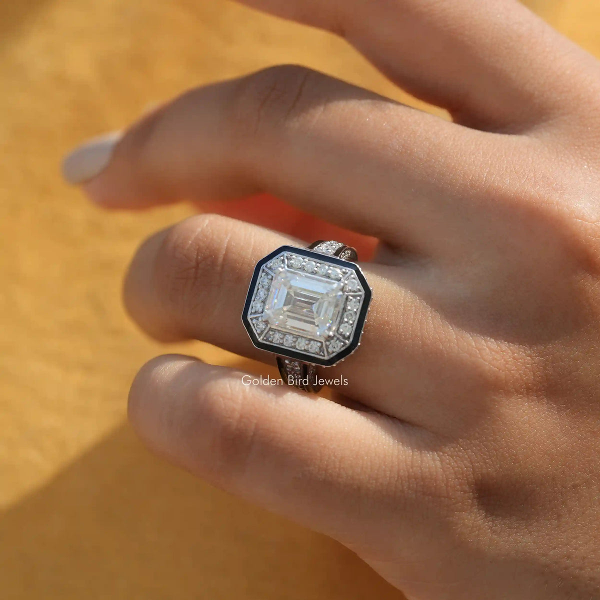 View of Emerald Cut Moissanite Halo Engagement Ring In Finger