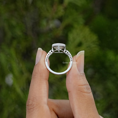 Sterling silver solitaire ring showing the open gallery and round bezel setting from the side