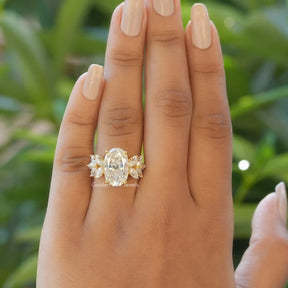 View of Oval Cut Moissanite Engagement Cluster Ring In Finger