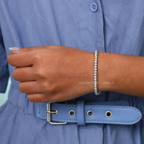 [On hand front view of round cut moissanite bracelet made of prong setting]-[Golden Bird Jewels]