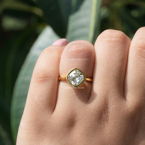 View of Cushion Cut Moissanite Solitaire Ring In Yellow Gold