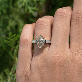 Yellow Old Mine Oval Moissanite Three Stone Ring