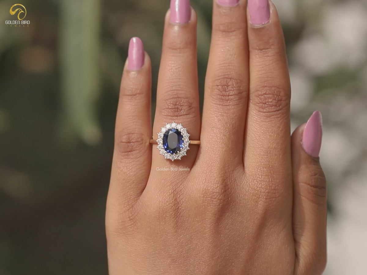 Ovaler Halo Blauer Saphir Verlobungsring