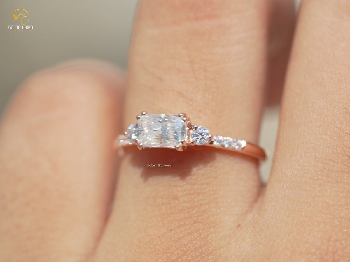East West Colorless Radiant Cut Moissanite Ring