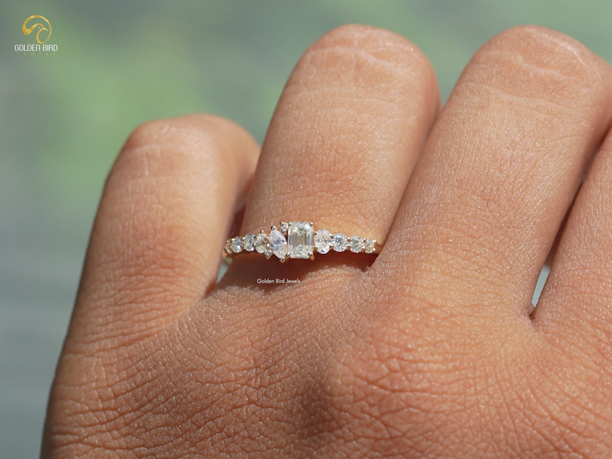 Halber Eternity-Ring mit Moissanit im Smaragdschliff