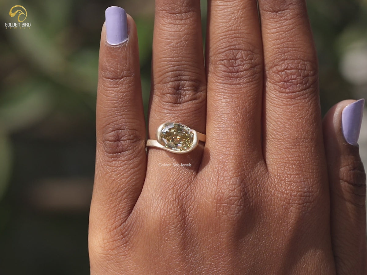 Step Cut Oval Moissanite Solitaire Bypass Ring