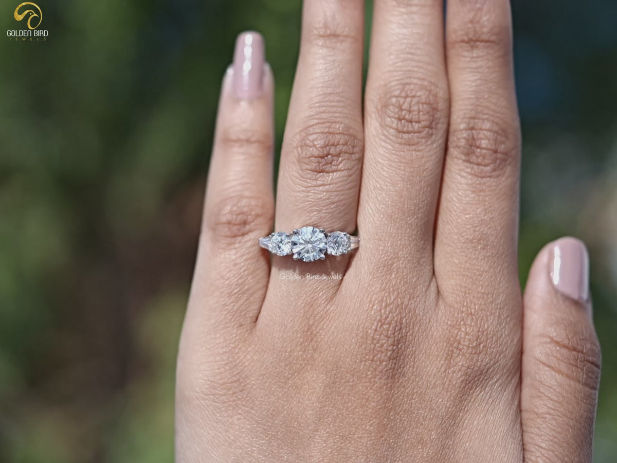 Round And Tapered Baguette Five Stone Ring