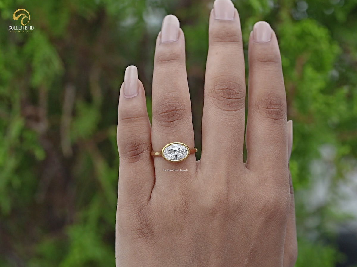 East West Oval Cut Lab Diamond Bezel Set Ring