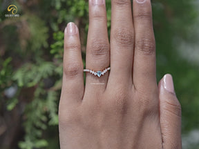 You tube Video of Pear Gemstone And Round Moissanite Dainty Ring	