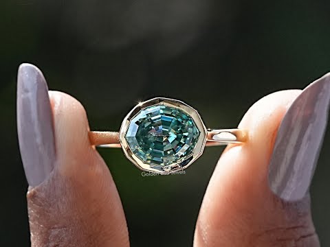 You tube Video of Blue Green Moissanite Step Cut Oval Solitaire Ring
