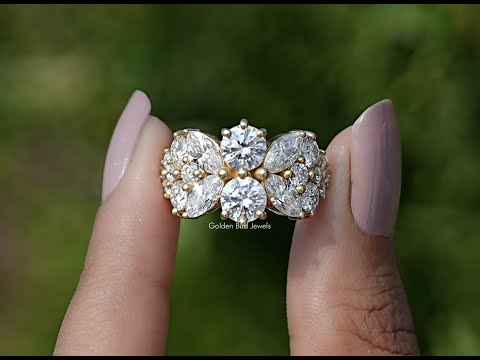 Vintage-Ring mit Moissanit im Marquise- und Rundschliff