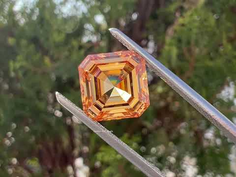 You tube video of orange Asscher moissanite loose stone 