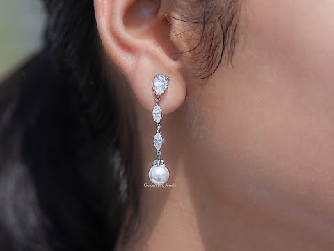 You tube Video of Pear And Marquise Cut Moissanite Stud Earrings
