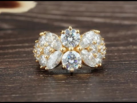 Vintage-Ring mit Moissanit im Marquise- und Rundschliff