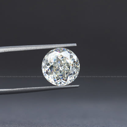 In Tweezer View Of Portuguese Cut Round Loose Moissanite