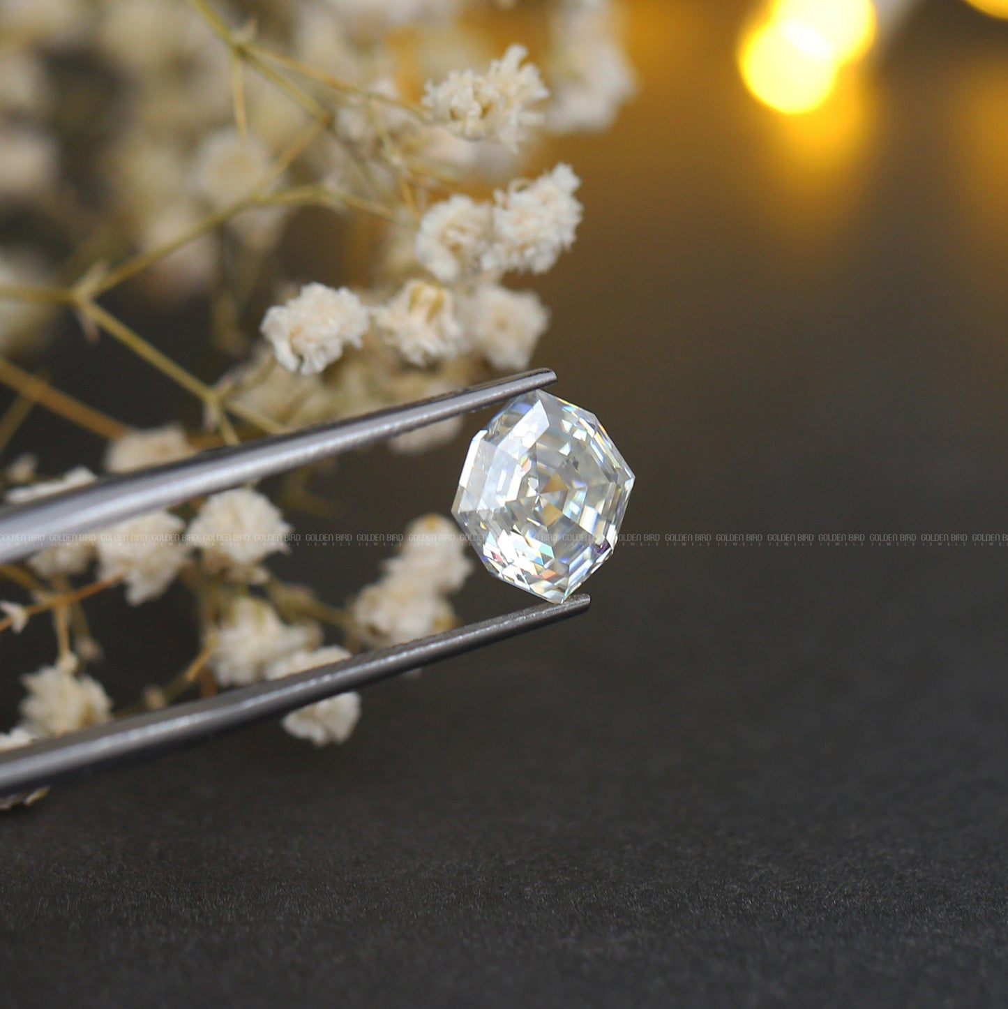 In Tweezer View Of Moissanite Step Cut Cushion Cut Loose