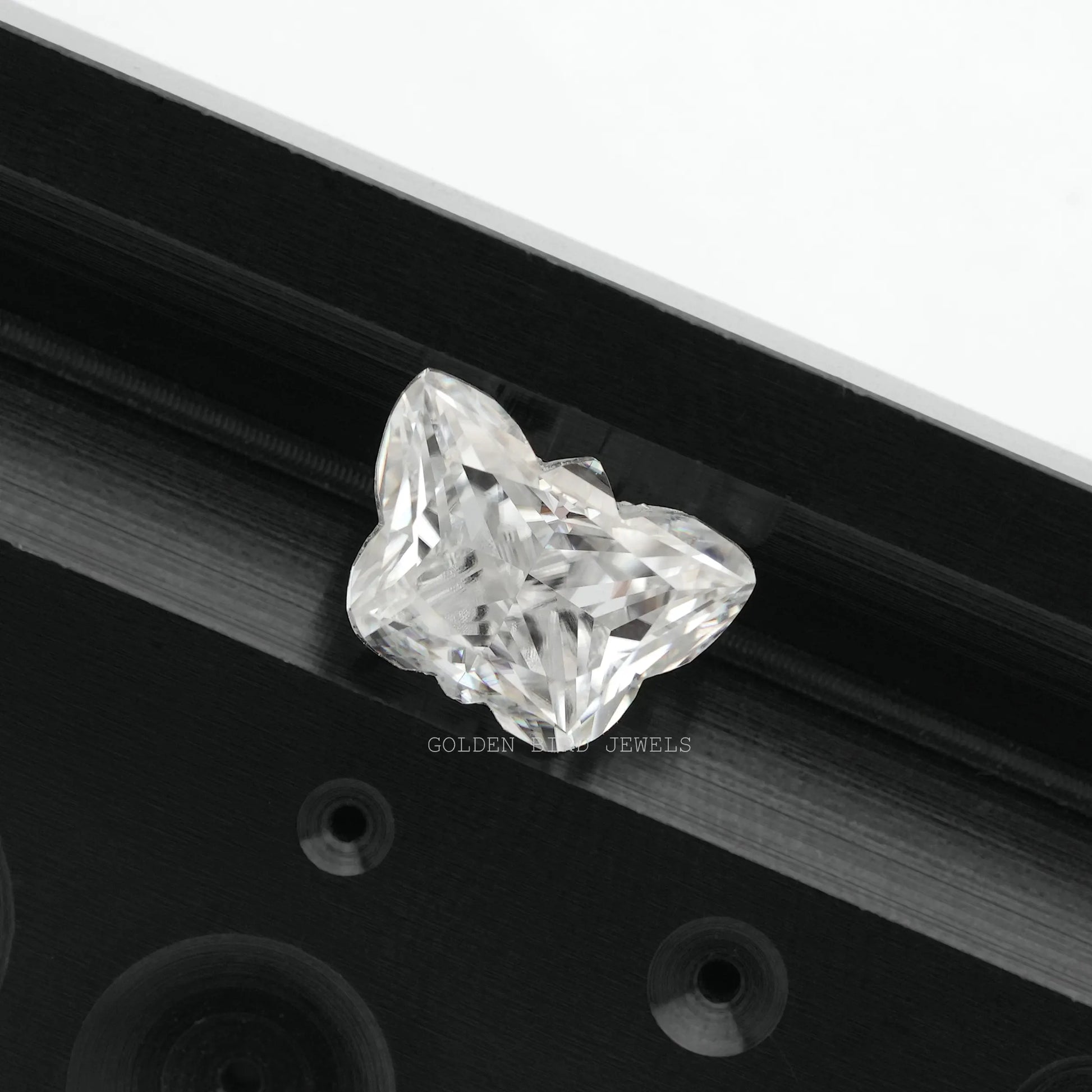 View Of Colorless Butterfly Cut Loose Stone In White