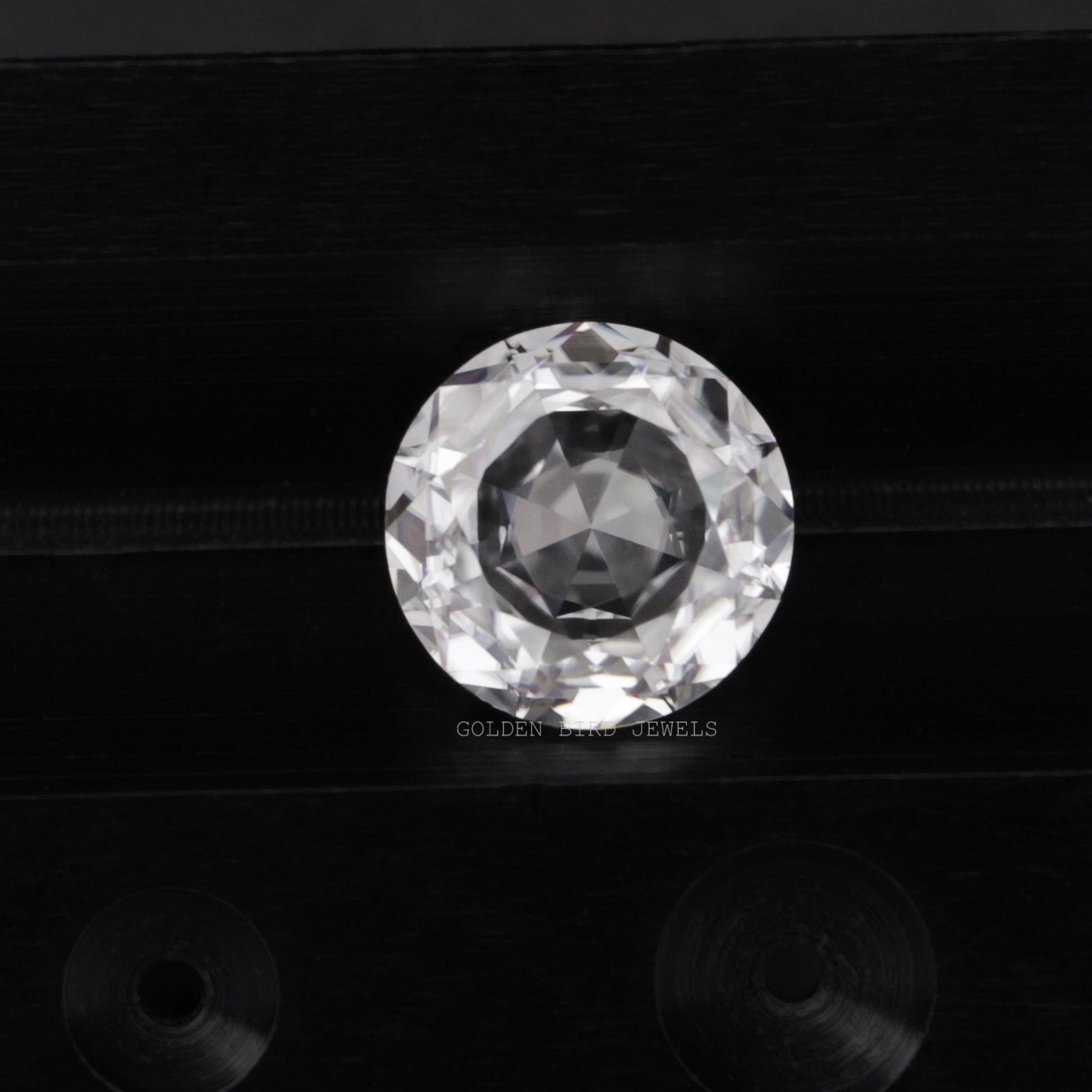 Detailed View Of Colorless Rose Cut Round Loose