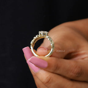 Back view of moissanite engagement  ring set  in a secure setting