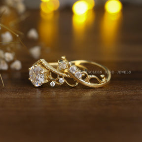 Back view of a round cut Moissanite bridal ring set with intricate vintage design