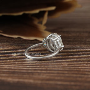  Back view of a three-stone moissanite engagement ring in white gold 